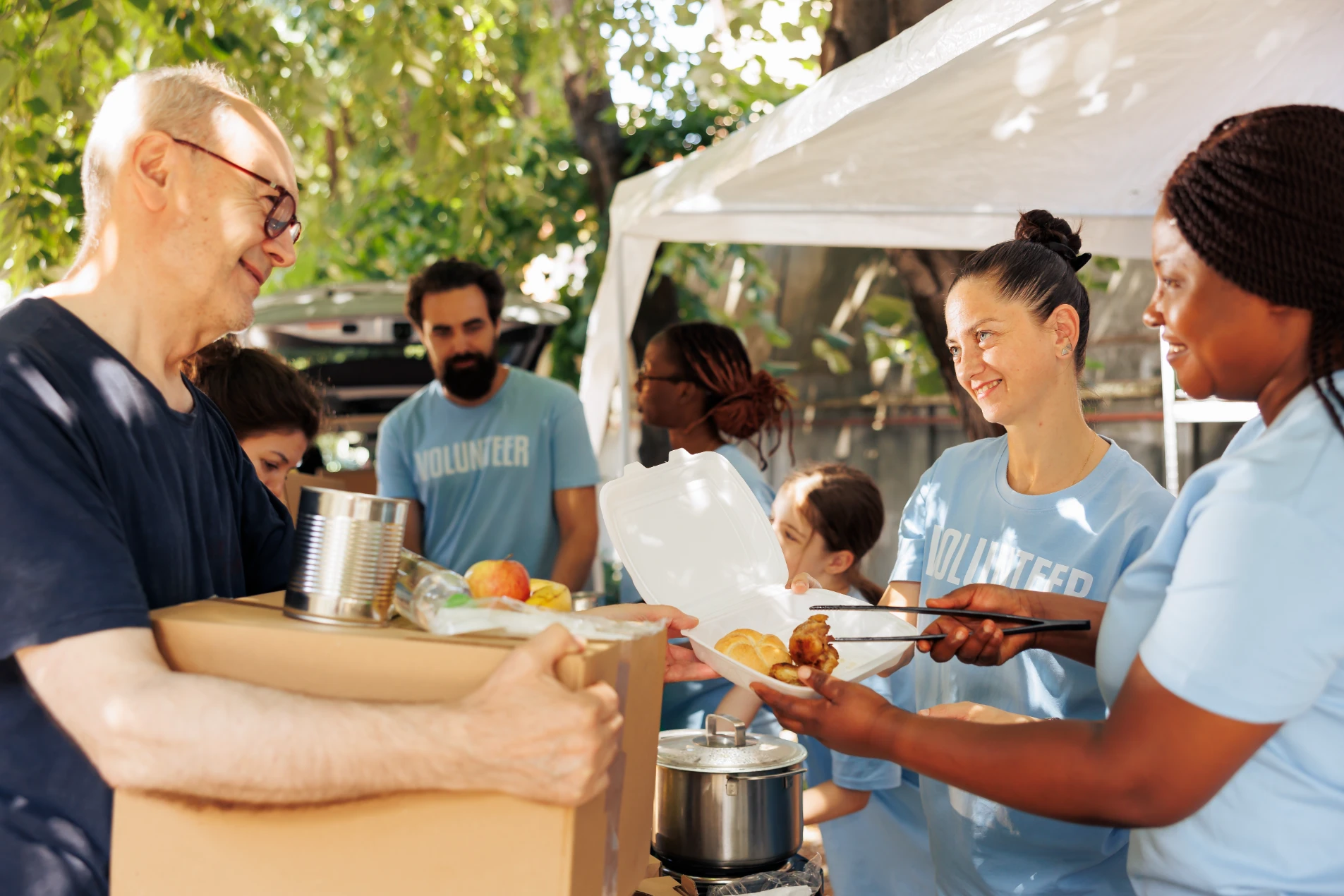 volunteers-distributing-Image.webp